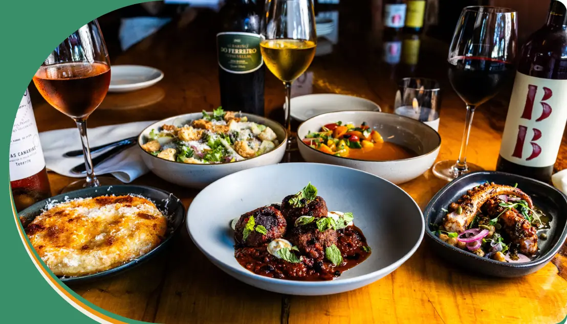 A table with several different types of food on it.