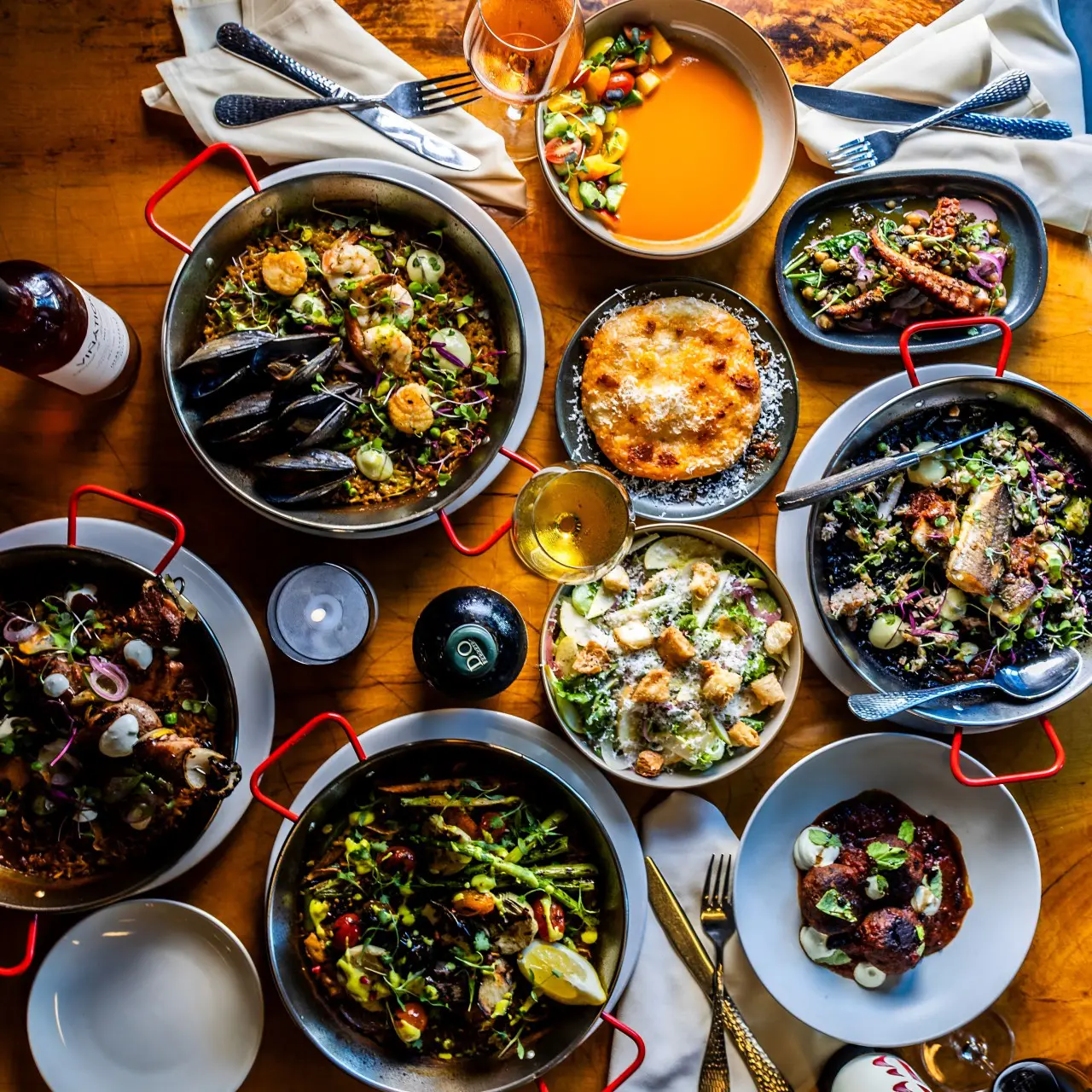 A table filled with lots of different types of food.