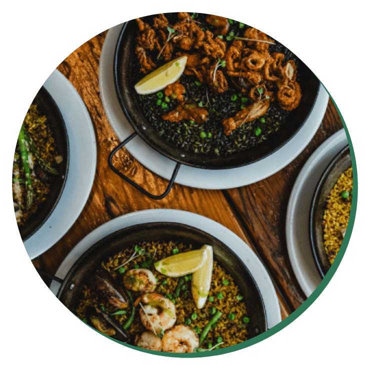 A table with bowls of food on it